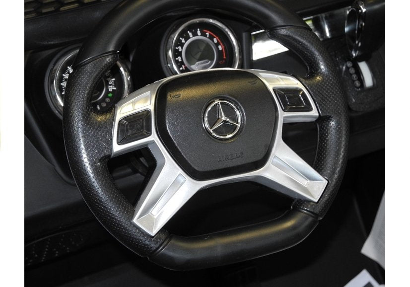 Elektrinis vaikiškas automobilis Mercedes Unimog baltas