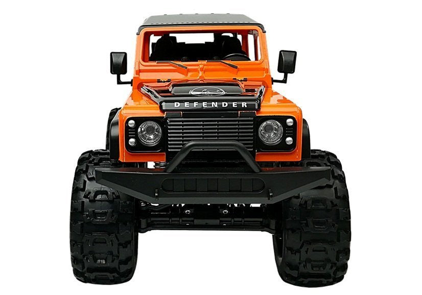 Nuotoliniu būdu valdomas Land Rover Defender R/C, oranžinis 1:14
