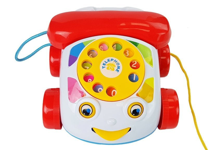 Tempimo telefonas ant ratukų su baterija kūdikiui