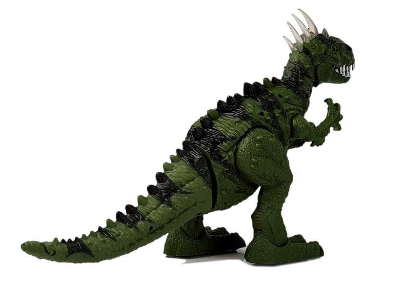 Žalias dinozauras su baterija juda su garso projektoriumi
