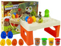 Plastilino staliukas „ramunė“ su dinozaurais, kiaušiniais, formelėmis ir ugnikalniu su šviečiančia lava, 4 spalvos