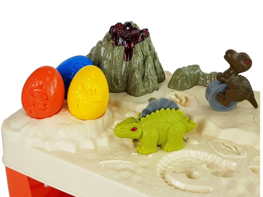 Plastilino staliukas „ramunė“ su dinozaurais, kiaušiniais, formelėmis ir ugnikalniu su šviečiančia lava, 4 spalvos